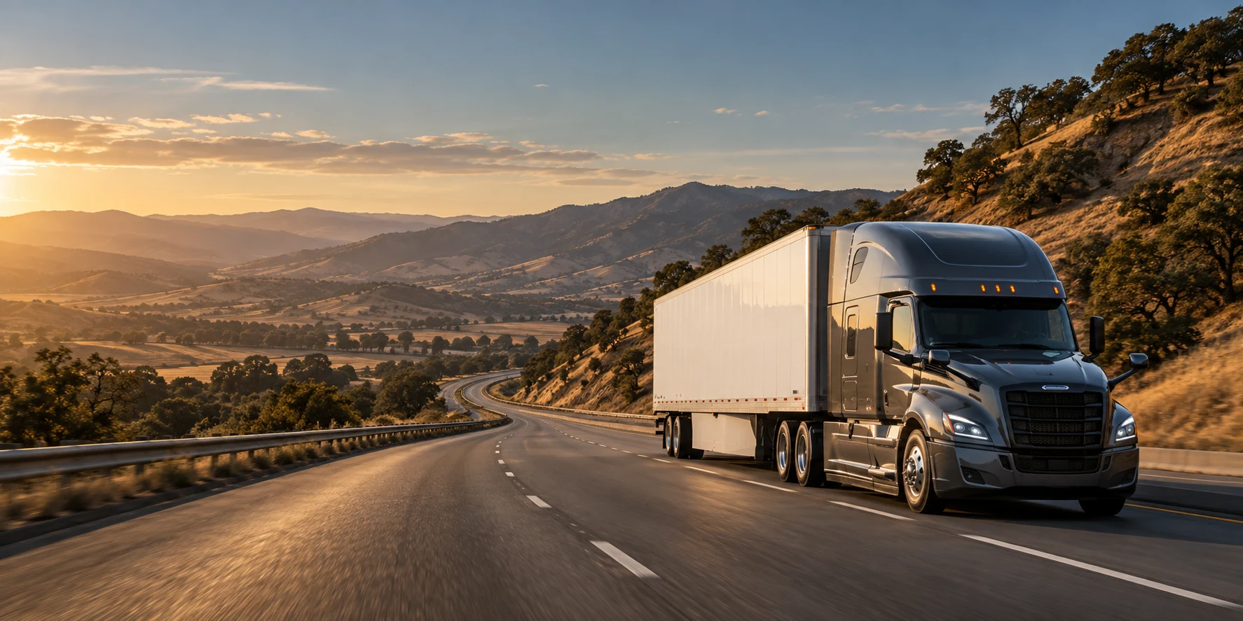 A semi truck on an open highway through the golden California hills